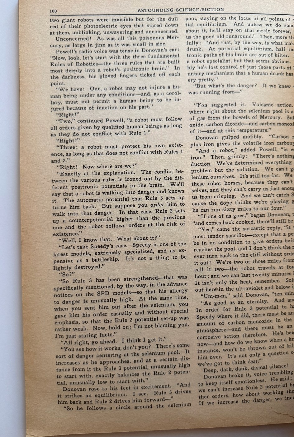 Page 100 of Astounding Science Fiction, March 1942, with the Three Laws of Robotics recited in full